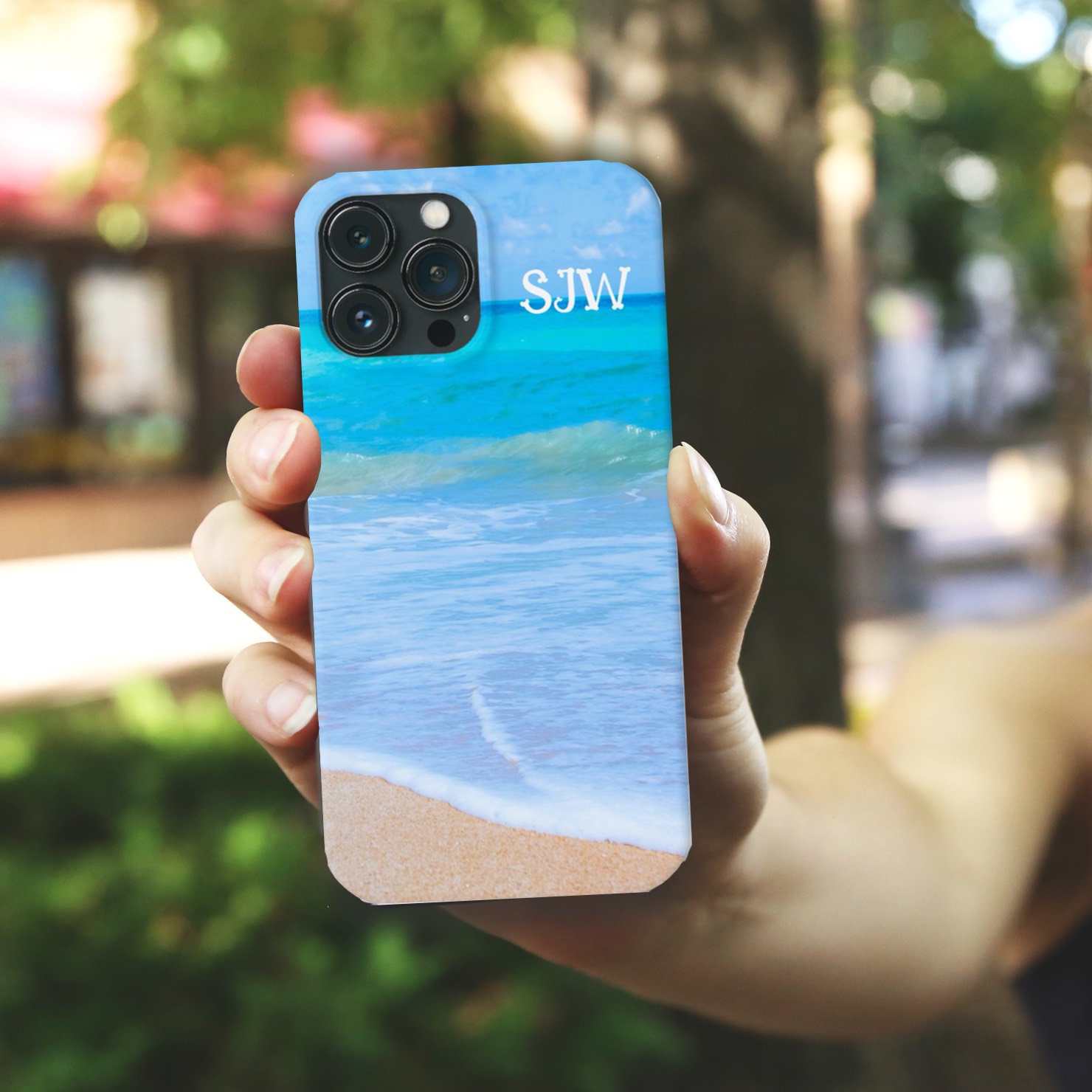 Personalized iPhone case with tropical blue ocean water and monogram initials.